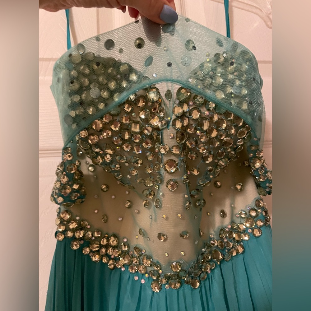 Beautiful and intricately detailed beaded prom dress from Norman’s Bridal